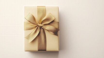 Luxurious gold ribbon tied around a present,