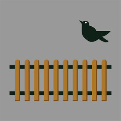 bird flying over the garden fence