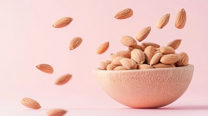 Organic almond seeds in wooden bowl for healthy snacks