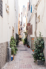 A narrow alleyway, , Casablanca is filled with vibrant life.  