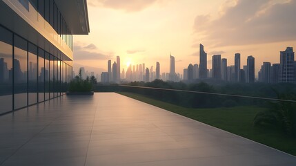 Modern building with glass facade overlooking a city skyline at sunset.
