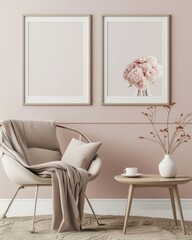 Two framed prints of a pink floral bouquet and a blank frame hanging above a chair and side table in a blush pink room