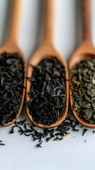 Wooden Spoons Filled with Black and Green Tea Leaves - A Realistic Closeup Image