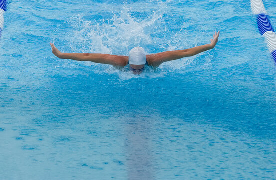 Butterfly Stroke Swimmer in Action Captured from Above