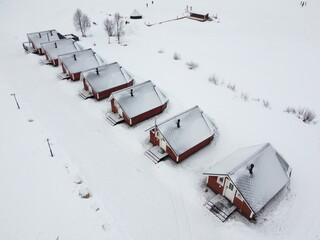 Inari in Finland is located on the shore of a large lake, where you can enjoy the great outdoors in summer and the Northern Lights in winter.