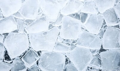 Obraz premium Clear Ice Fragments on a Flat Surface for Textures and Backgrounds