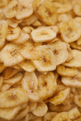 Dried banana slices stacked in a natural setting