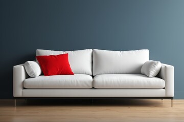 Fototapeta premium there is a white couch with red pillows on it in a room