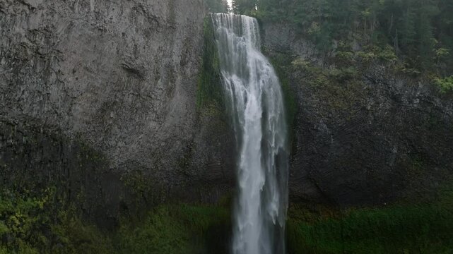 Breathtaking 4K aerial footage of Salt Creek Falls, Oregon's second-highest waterfall at 286 feet, surrounded by lush evergreen forests in Lane County. Captured in October.