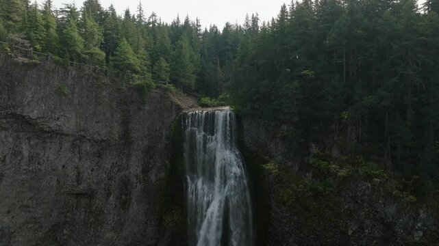 Breathtaking 4K aerial footage of Salt Creek Falls, Oregon's second-highest waterfall at 286 feet, surrounded by lush evergreen forests in Lane County. Captured in October.
