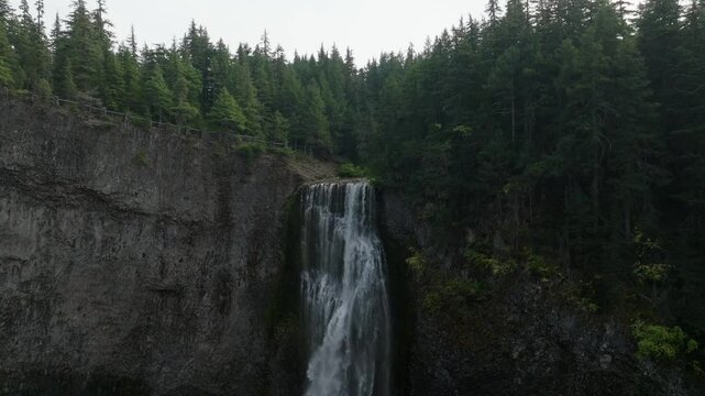 Breathtaking 4K aerial footage of Salt Creek Falls, Oregon's second-highest waterfall at 286 feet, surrounded by lush evergreen forests in Lane County. Captured in October.