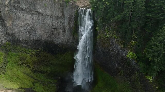 Breathtaking 4K aerial footage of Salt Creek Falls, Oregon's second-highest waterfall at 286 feet, surrounded by lush evergreen forests in Lane County. Captured in October.