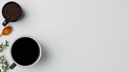 Obraz premium Warm Cup of Coffee with Spoon and Spilled Coffee Creating Cozy Mood