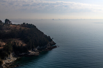 seascape with cliff and clouds