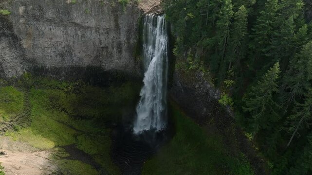 Breathtaking 4K aerial footage of Salt Creek Falls, Oregon's second-highest waterfall at 286 feet, surrounded by lush evergreen forests in Lane County. Captured in October.