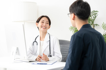 Obraz premium 女性医師 診察