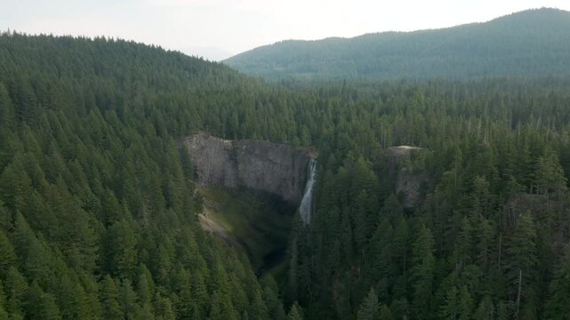 Breathtaking 4K aerial footage of Salt Creek Falls, Oregon's second-highest waterfall at 286 feet, surrounded by lush evergreen forests in Lane County. Captured in October.