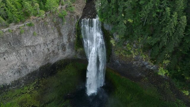 Breathtaking 4K aerial footage of Salt Creek Falls, Oregon's second-highest waterfall at 286 feet, surrounded by lush evergreen forests in Lane County. Captured in October.