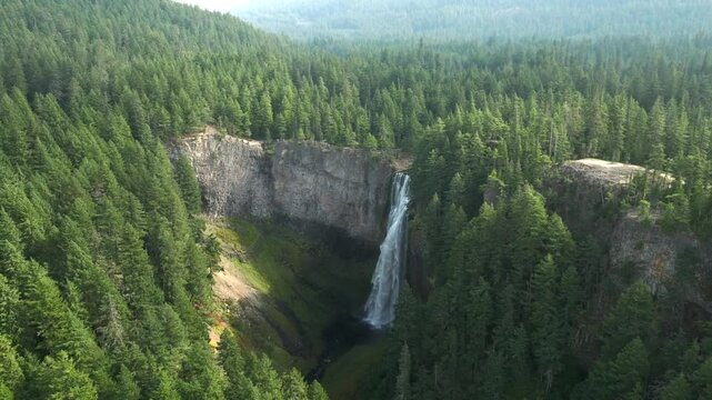 Breathtaking 4K aerial footage of Salt Creek Falls, Oregon's second-highest waterfall at 286 feet, surrounded by lush evergreen forests in Lane County. Captured in October.