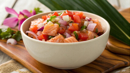 fresh bowl of lomi lomi salmon with tomatoes, onions, and herbs, showcasing vibrant colors and textures