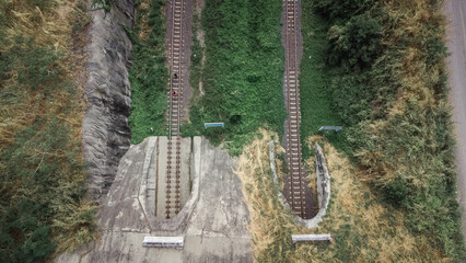 The Buddha's image tunnel is a railway line that passes through a stone mountain.