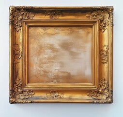 Gold picture frame with gold foil decor and carvings on a white wall, evoking old-world charm for rustic backgrounds, scrapbooking, or vintage-inspired designs.