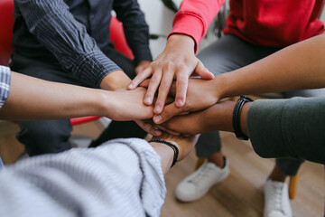 Close Up Of Diverse People Putting Their Arms Together