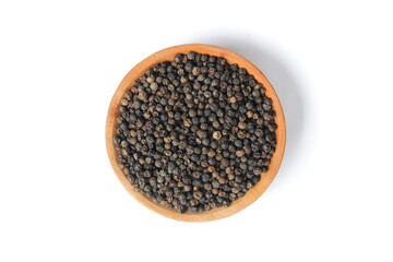 Black peppercorns ( Black pepper ) seeds on wooden plate isolated on white background. Food...