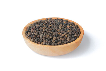 Black peppercorns ( Black pepper ) seeds on wooden plate isolated on white background. Food ingredients. Aromatic spice