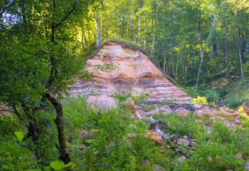 a fragment of a mountain river on a shallow riverbed, the time of the year in nature