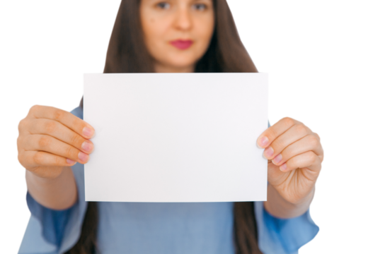 A young, attractive girl holding mockup with empty paper. A sign, an empty space for advertising, inscription, design. White background.