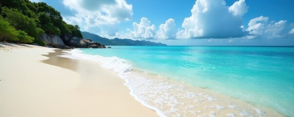 Obraz premium Gentle waves lap Seychelles shore, soft sand, clear water , Seychelles, tranquility, landscape