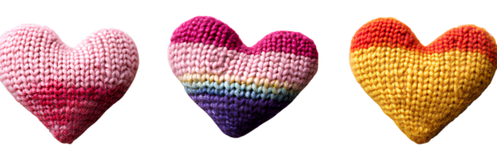  Three cute, colorful, hart-shaped knitted or crocheted items isolated on a transparent background