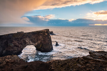 Dyrholaey peninsula in Iceland with volcanic rocks in the sea