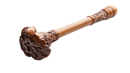 A wooden stick with a carved flower on it