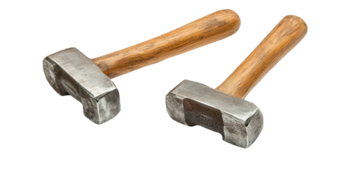 Two hand-forged hammers with wooden handles, showcasing their craftsmanship and rustic charm. Ideal for blacksmithing or woodworking projects.