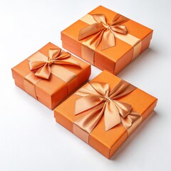 Obraz premium Three Orange Gift Boxes with Rose Gold Ribbon,Product Photography,Gift Concept Gift,Packaging