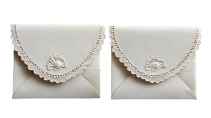 Two elegant off-white envelopes with intricate lace detailing and embossed floral accents. Perfect for a special message.