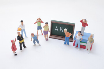 A Miniature Figures with Chalkboard Illustrating Education