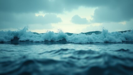 Fototapeta premium Waves crashing in the sea under a cloudy sky, creating a serene sea artwork.