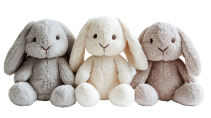 Three fluffy bunny toys sitting on transparent background