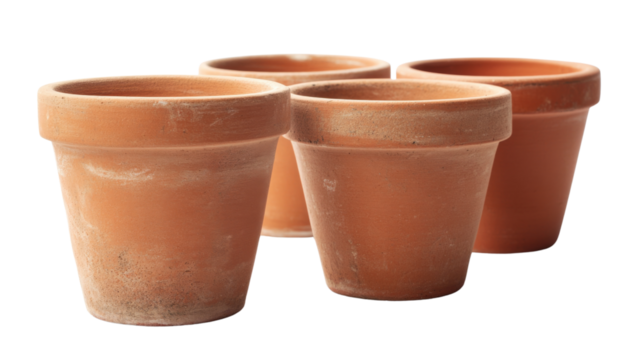 Four empty terracotta flower pots isolated on transparent background