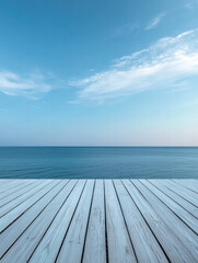 Serene Seascape: A picturesque shot featuring the calm, blue ocean stretching to the horizon, framed by a weathered wooden deck, capturing a sense of peace and tranquility.