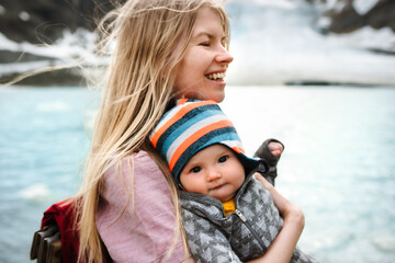 Mother traveling with infant baby in mountains family mom and child having fun hiking outdoor together healthy lifestyle active summer vacations candid emotions, Mothers day holiday