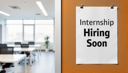 Internship hiring announcement on an office wall for job boards, career websites, corporate communications, student recruitment materials, and professional development resources