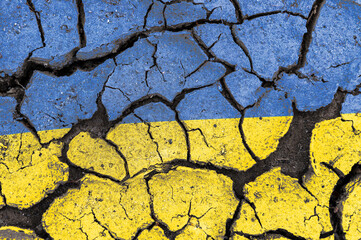 Cracked Ukraine flag. Ukrainian flag painted on a cracked wall. Distressed flag of Ukraine