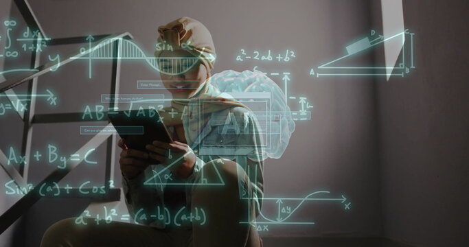 Image of scientific data processing over biracial woman in hijab using laptop