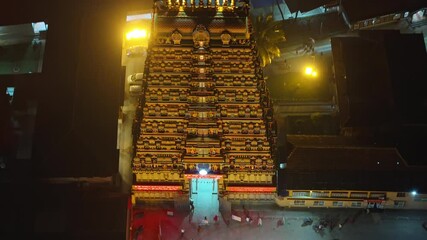 Aerial view of Dehradun city in India during a stunning orange sunset, showcasing rows of residential houses in Dehradun, Uttarakhand. A beautiful city in India, captured in the evening.