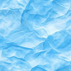 Obraz premium Crumpled blue paper texture with soft shadows