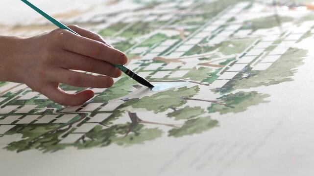 Art painting. Visual art. Hobby inspiration. The artist creates a graphic picture, Family tree, using watercolors and ink. Brush in hand draws. Green color. Illustrator.